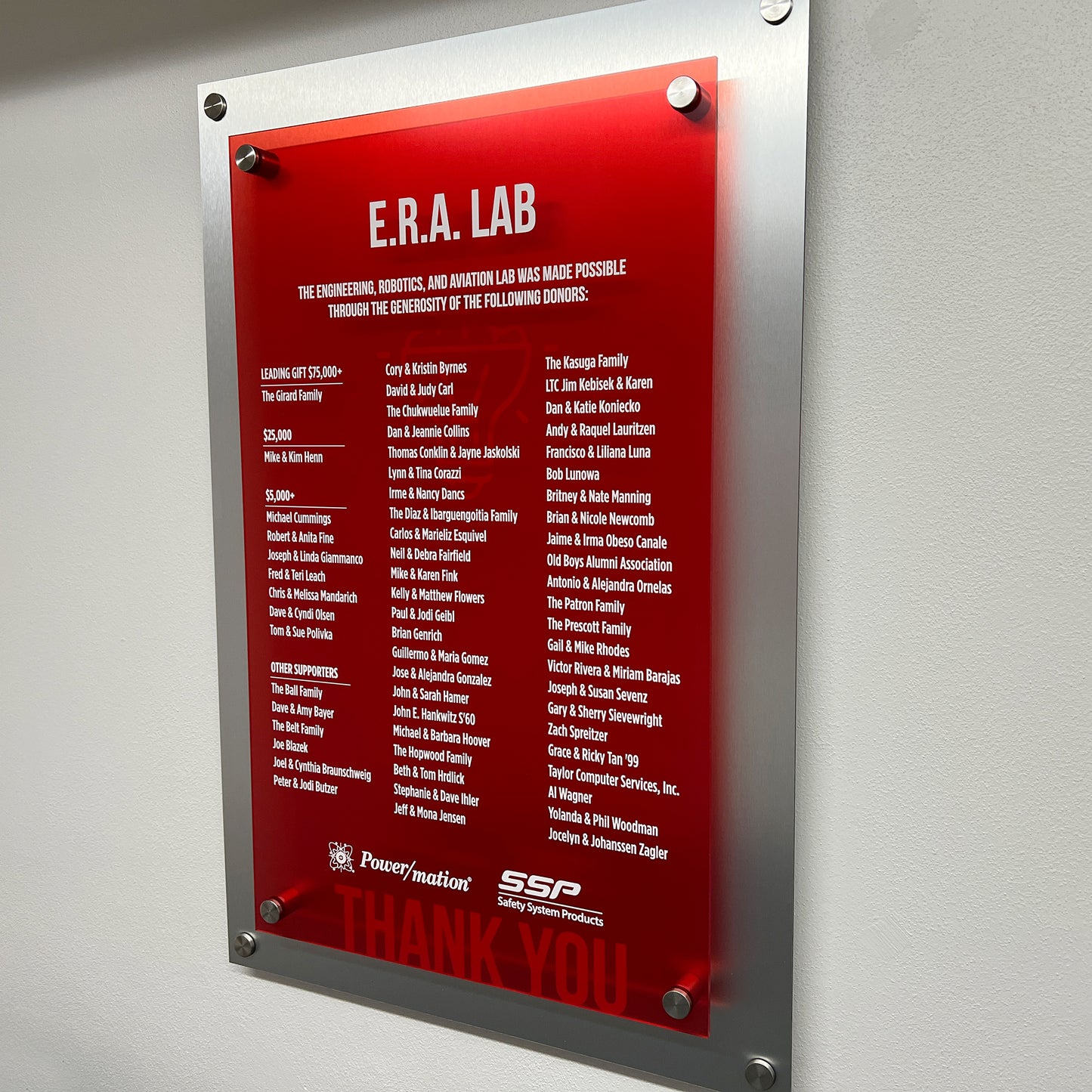 Donor signage with aluminum and transparent red plexi
