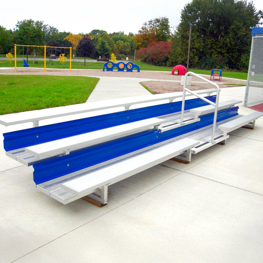 Model #B3R19A1. 3 row bleacher with blue risers and aisle with handrail.