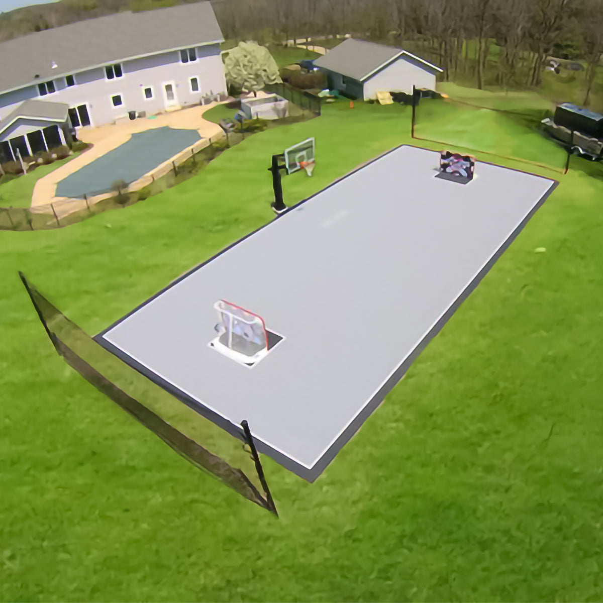 Backyard backstop nets for basketball/lacrosse court.