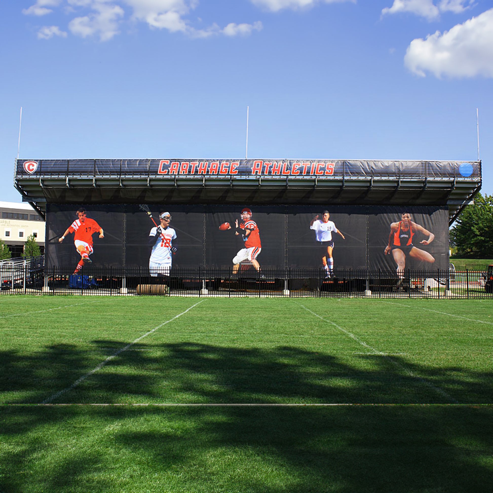 Bleacher wrap with custom logo and pictures.