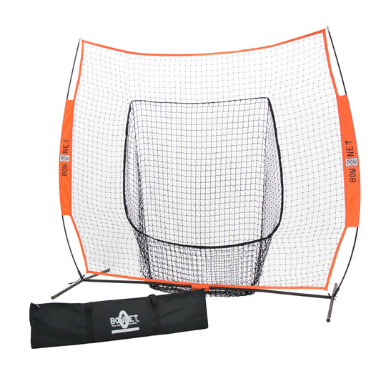 The Bownet Baseball Big Mouth is a portable practice net with an orange and black frame, central target area, pro-grade netting, and includes a black carrying bag placed in front.