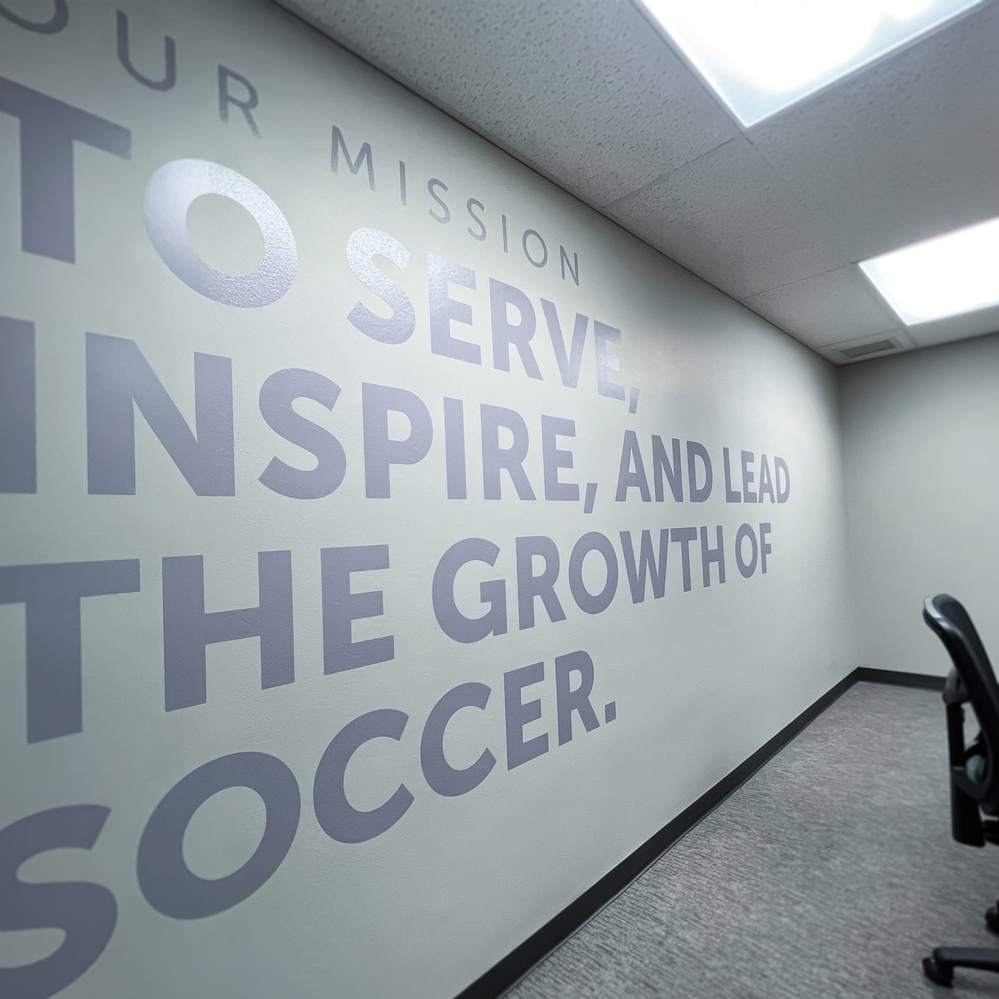 Vinyl wall wrap with words.