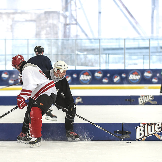 Model #FSP12. Portable padding boundary on hockey rink. Easily and safely divides your ice into smaller sections from multiple games.