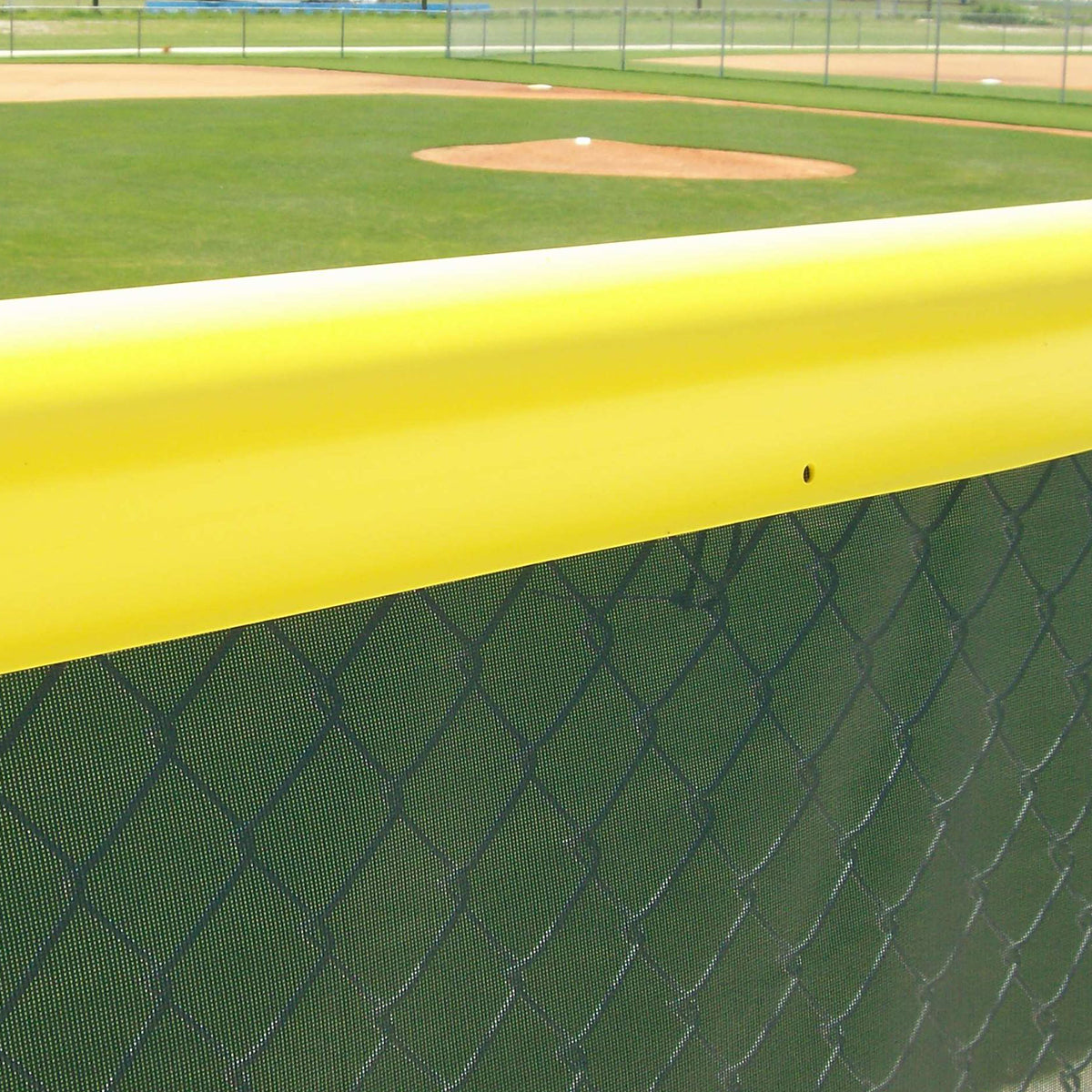 Model #FENCEG50PREM. Standard fence guard. Red with polyethylene to cover rough edges on chain link fence.