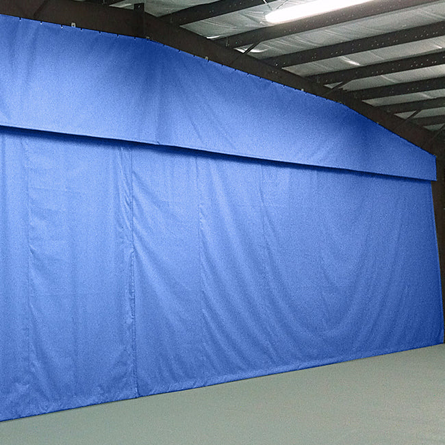 Fixed divider curtain.