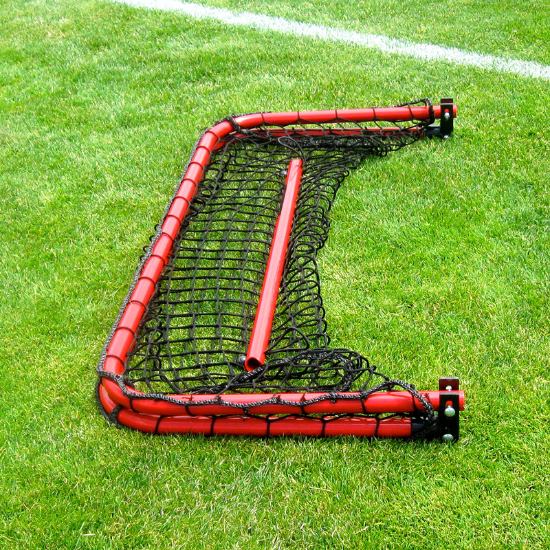 The Folding Aluminum Soccer Goals feature a red frame and black net, shown collapsed on green grass by a white field line, demonstrating their easy portability and convenient storage.