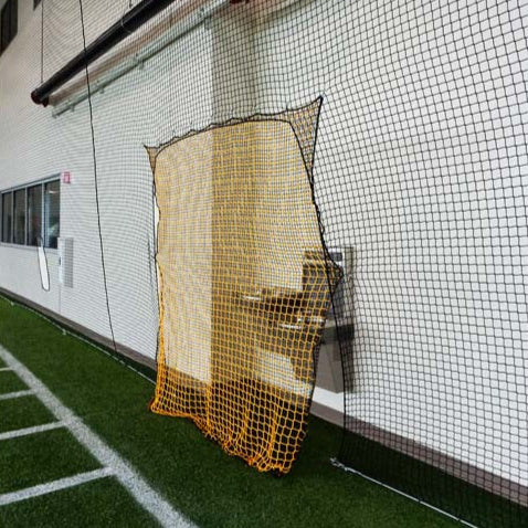 Froedtert Rehab Facility barrier netting indoor doorway for drinking fountain access.