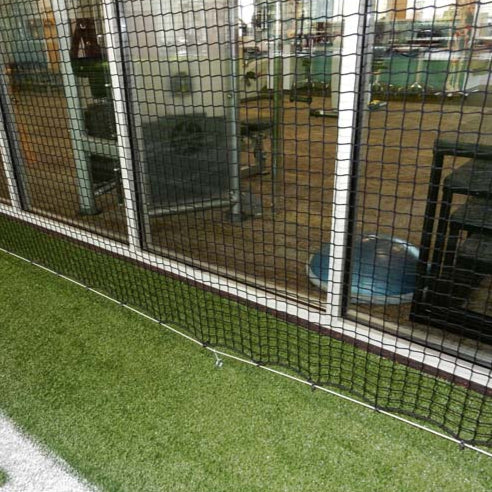 Froedtert Rehab Facility. Protective netting for athletic facility.