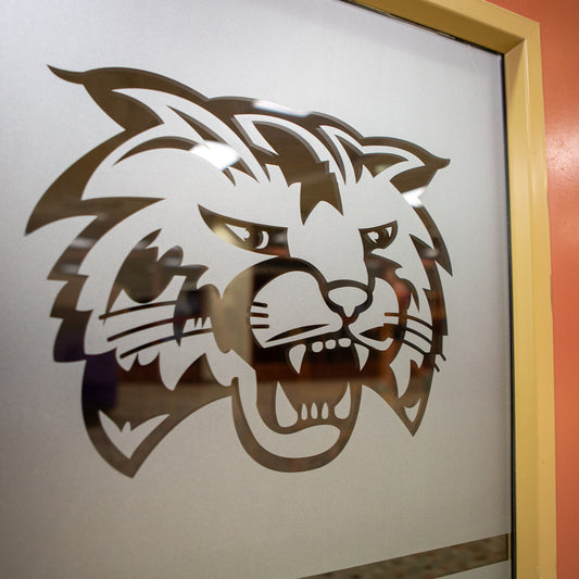 Frosted etched vinyl graphic on windows for privacy.