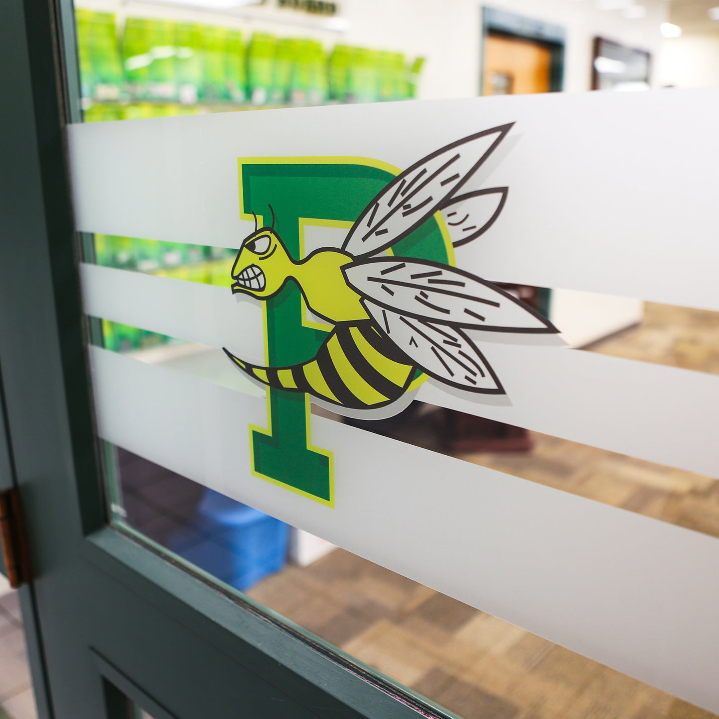Frosted etched vinyl graphic on windows for privacy.