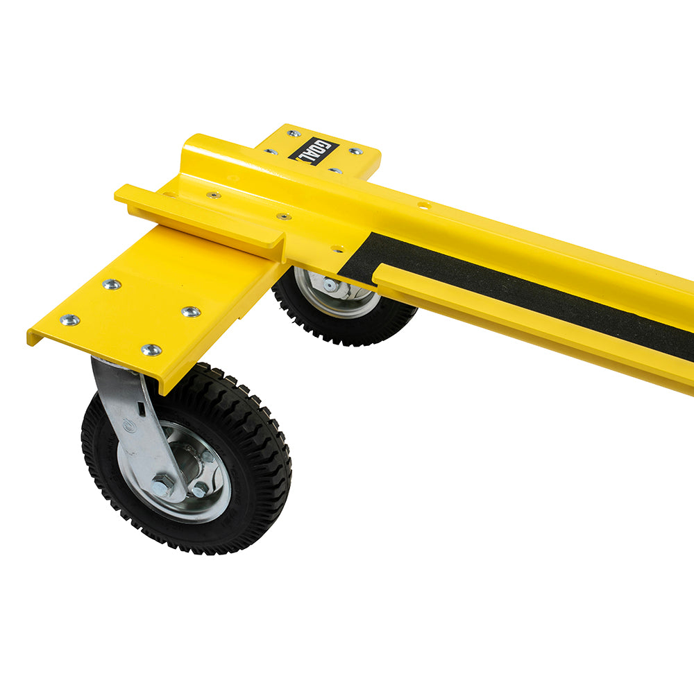 Close-up of the Goal Taxi: a yellow metal ramp with a black traction strip and two heavy-duty pneumatic wheels on metal brackets—perfect for moving athletic facility equipment and transporting goals.