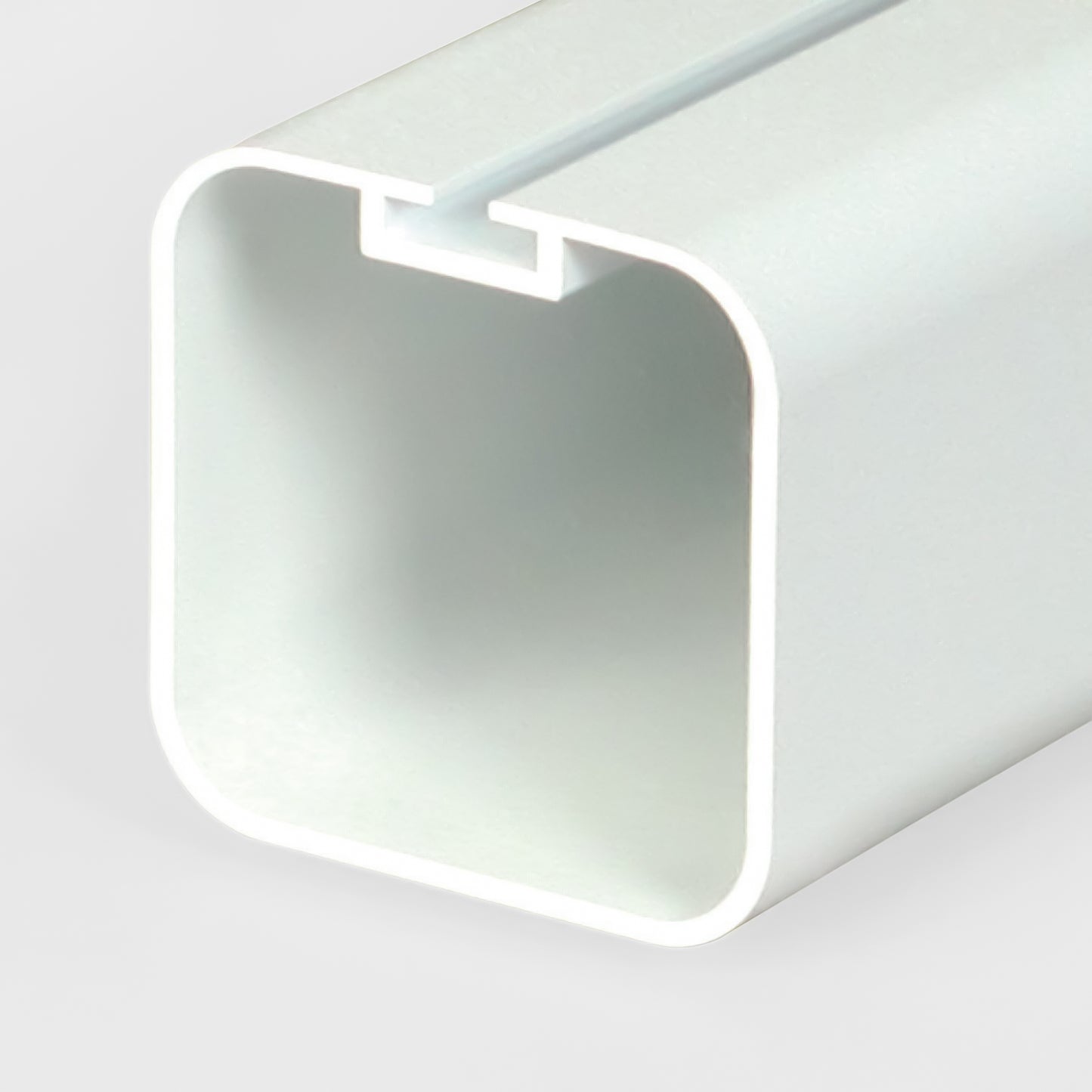 Close-up of a white, rectangular hollow extrusion with rounded corners and smooth edges, part of a Bison Official Indoor Futsal Goal, shown against a light gray background.