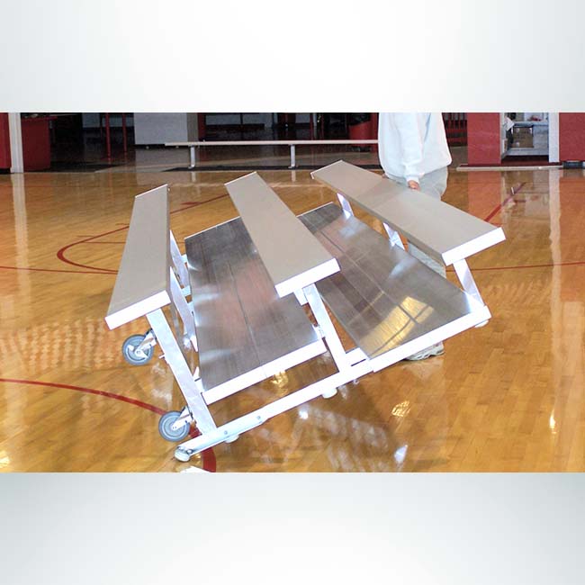 Model #KGTR03075STD. 3 row tip-n-roll bleacher.