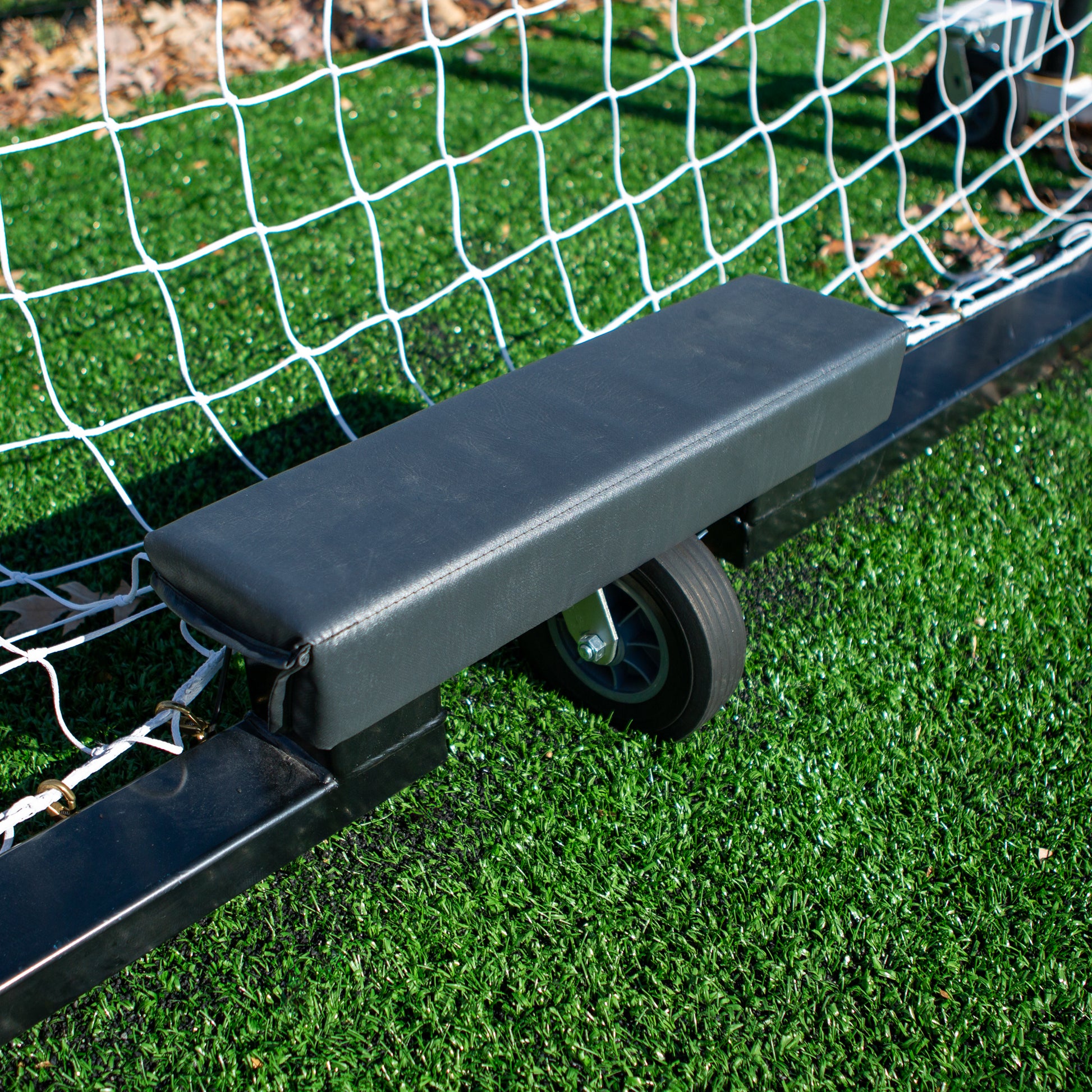 Model #PADBCB. Caster wheel backbar pad on soccer goal.