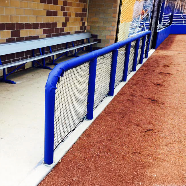 Royal blue padding on dugout rails.