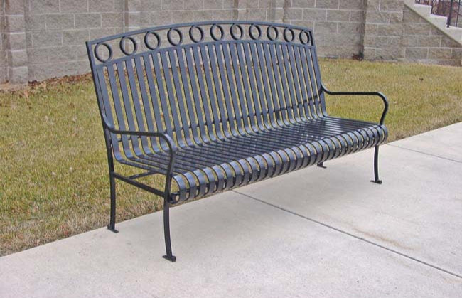 Model #PRISUB. Metal outdoor bench in black finish for parks and city streets.