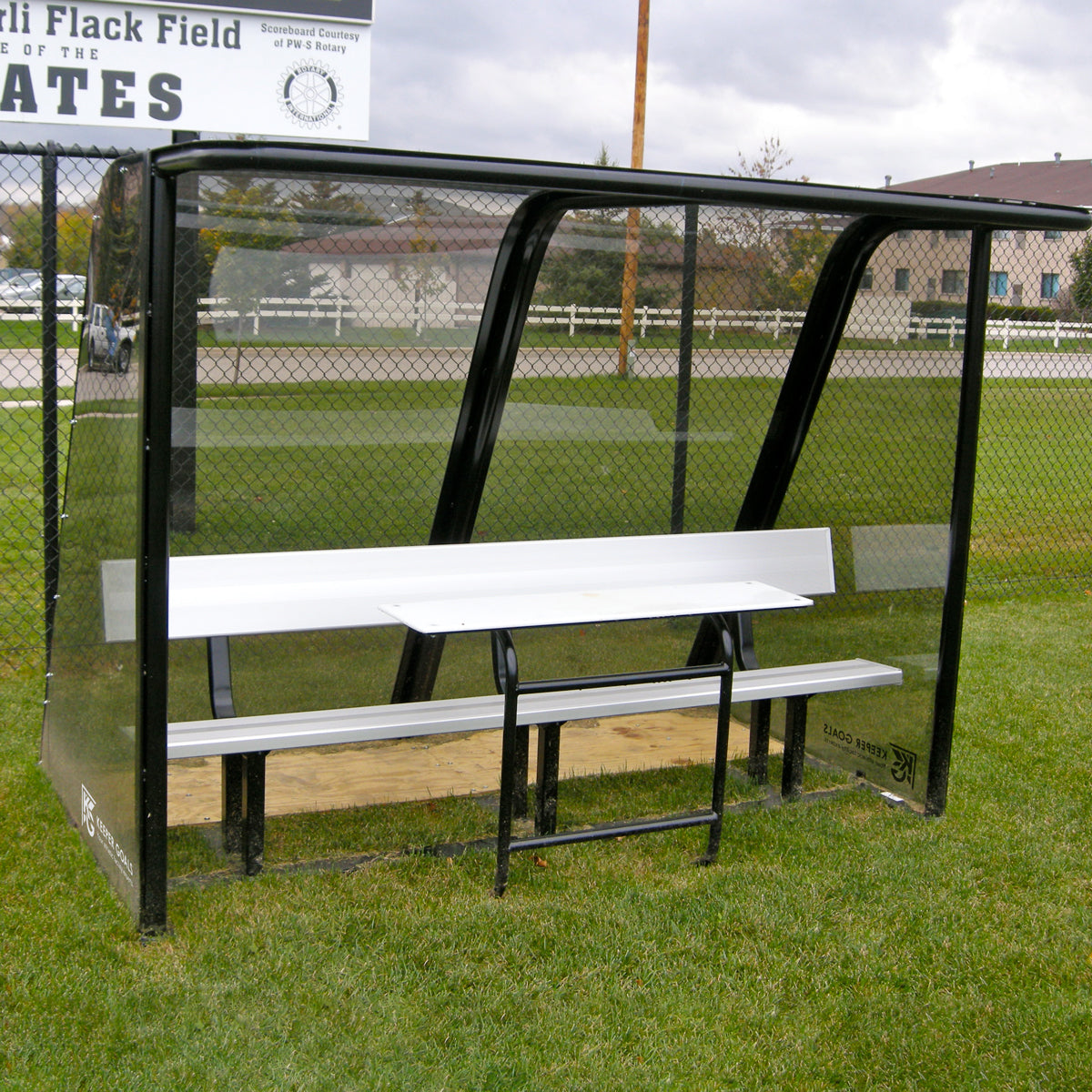 Model #PPS8. Deluxe Standard Style sideline shelter. Black with aluminum scorers table. Aluminum Bench.