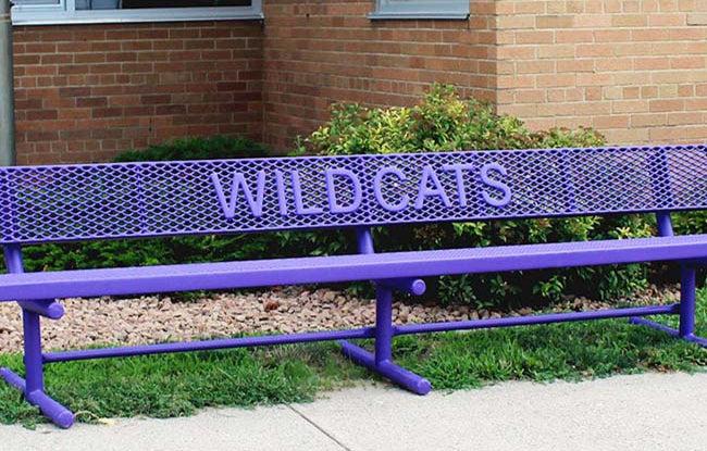 Model #PPS9346L1OPP. School branded 10' purple buddy bench outside of school.