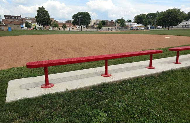 Model #PPS935607O11A. Champion park bench without backrest. 8 foot, red, expanded metal, surface mount.