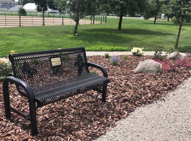 Model #PPS9741M3000. Grand Contour memorial bench. 4 foot, black, expanded metal, direct bury.