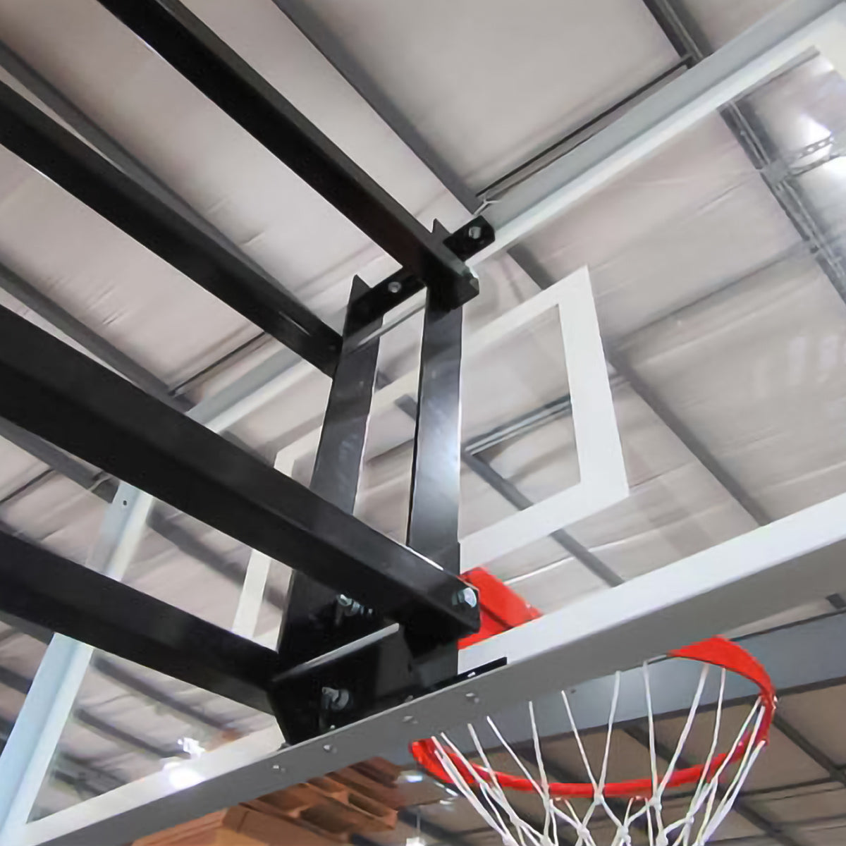 Roofmaster roof mount basketball goal mounted on garage roof back view.