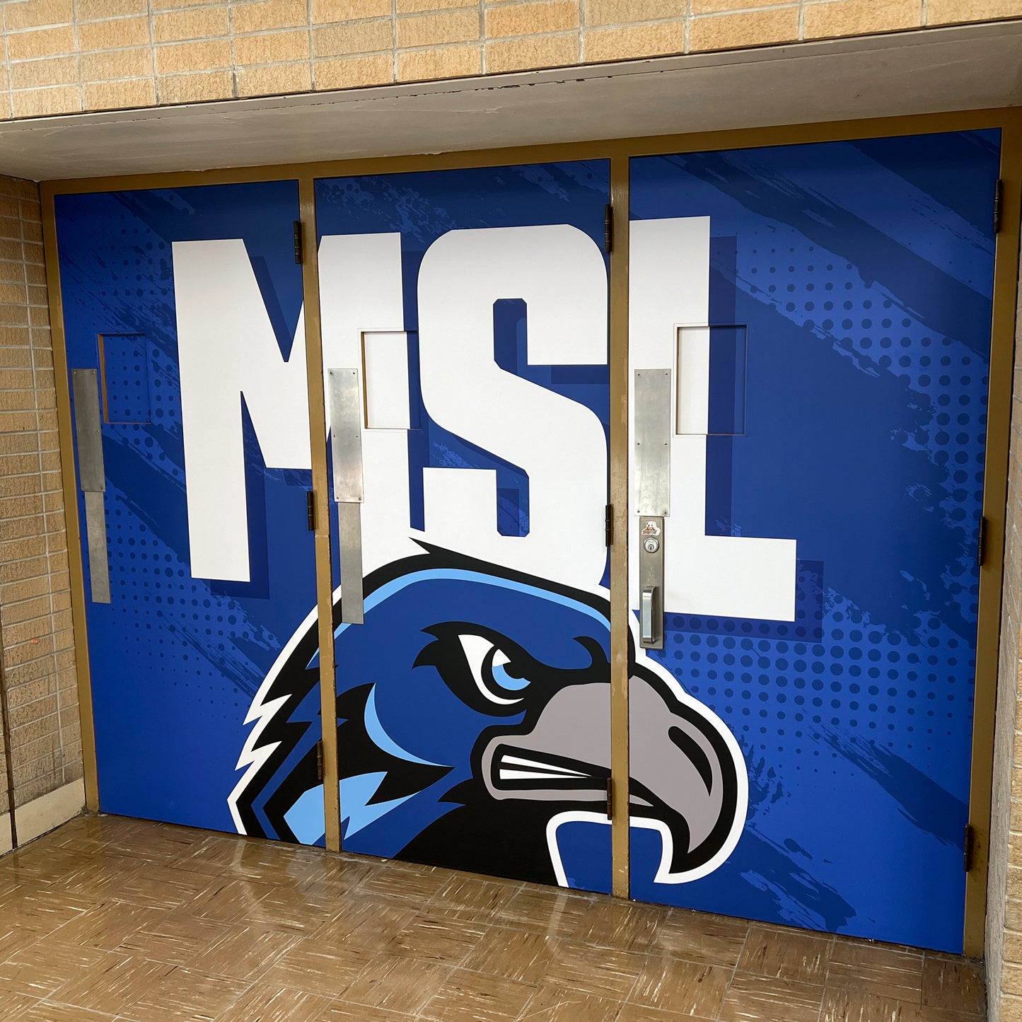 Custom door wrap on gym doors