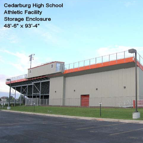 Water tight storage enclosure under bleachers.