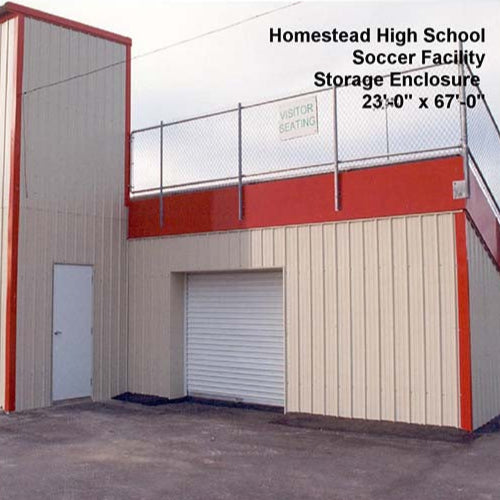 Water tight storage enclosure under bleachers.