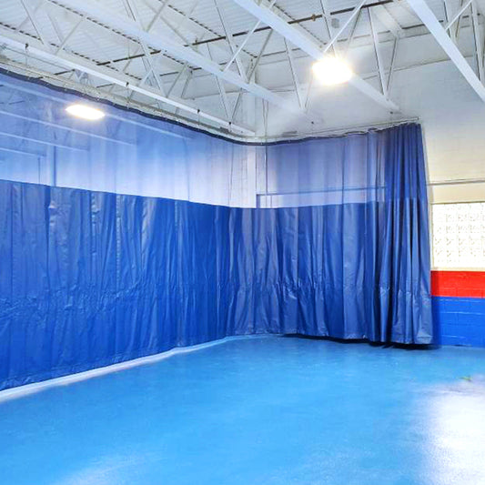 Walk-draw gym divider curtain.