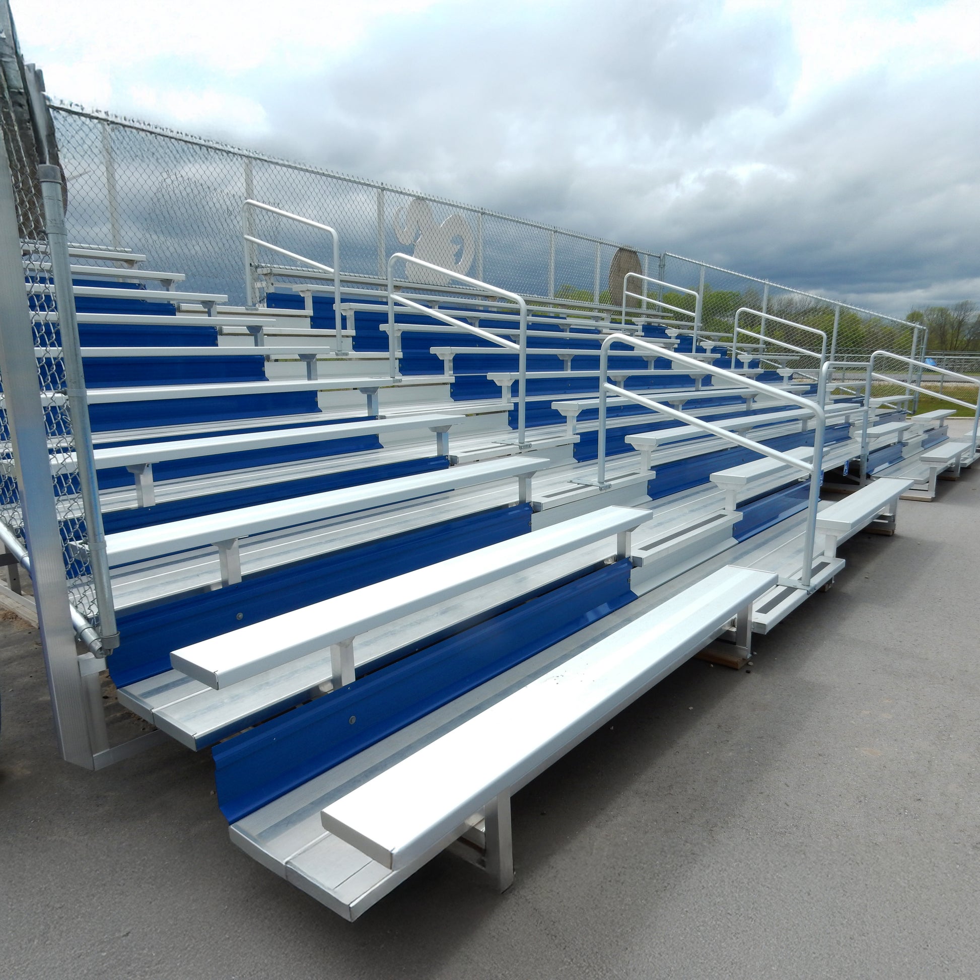 10 row custom bleachers with blue risers.
