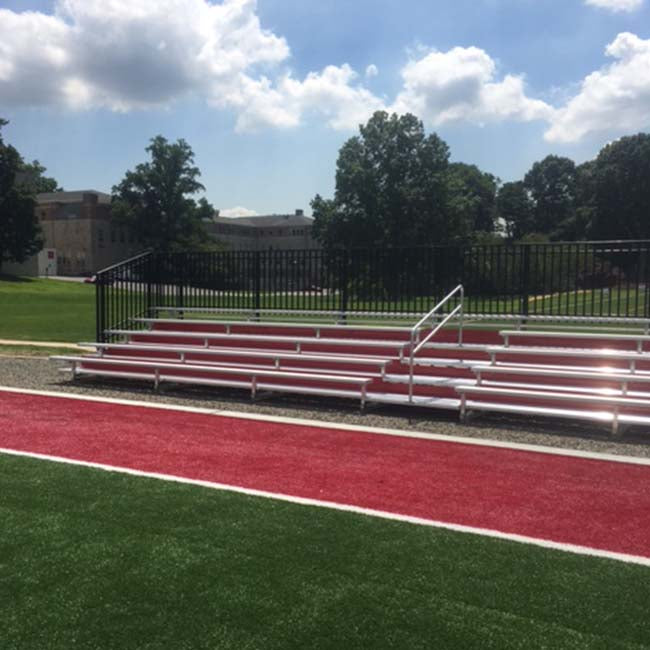 Custom 5 row bleachers with red risers.