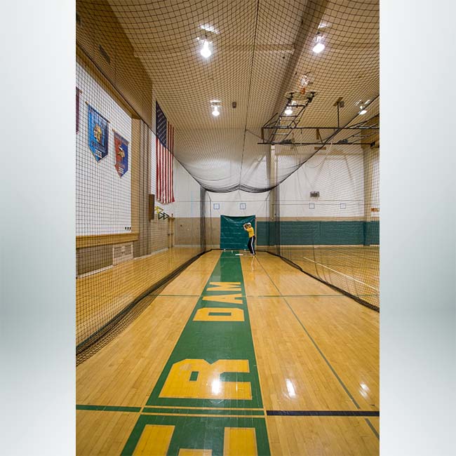 Model #BCTEN70IN. Indoor tension batting cage with hitter.