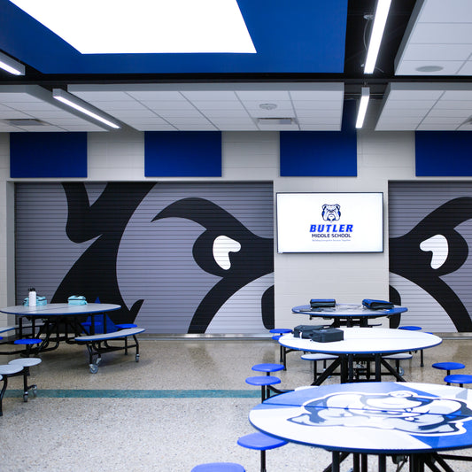 bulldog cafeteria graphics on concession rollup doors.