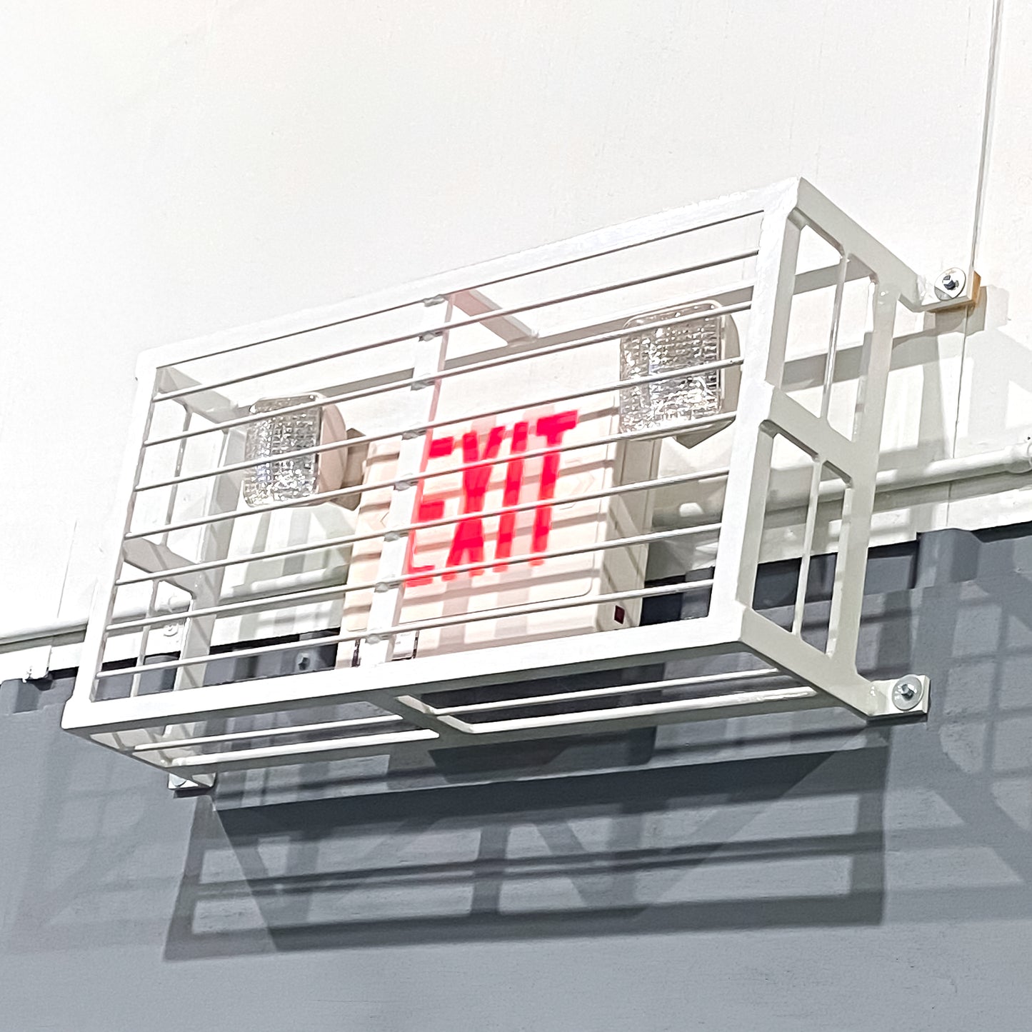 Custom cover for exit sign.