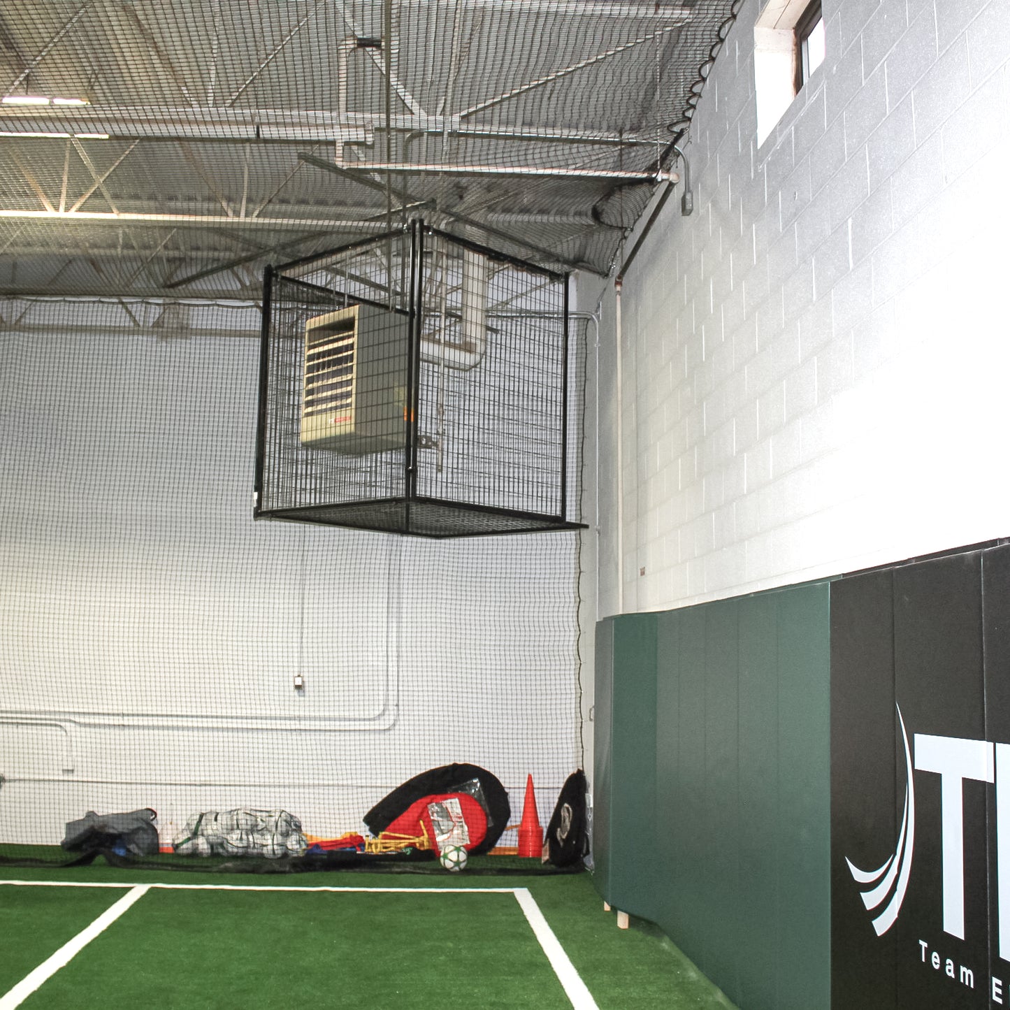 Furnace cage at an indoor soccer facility.