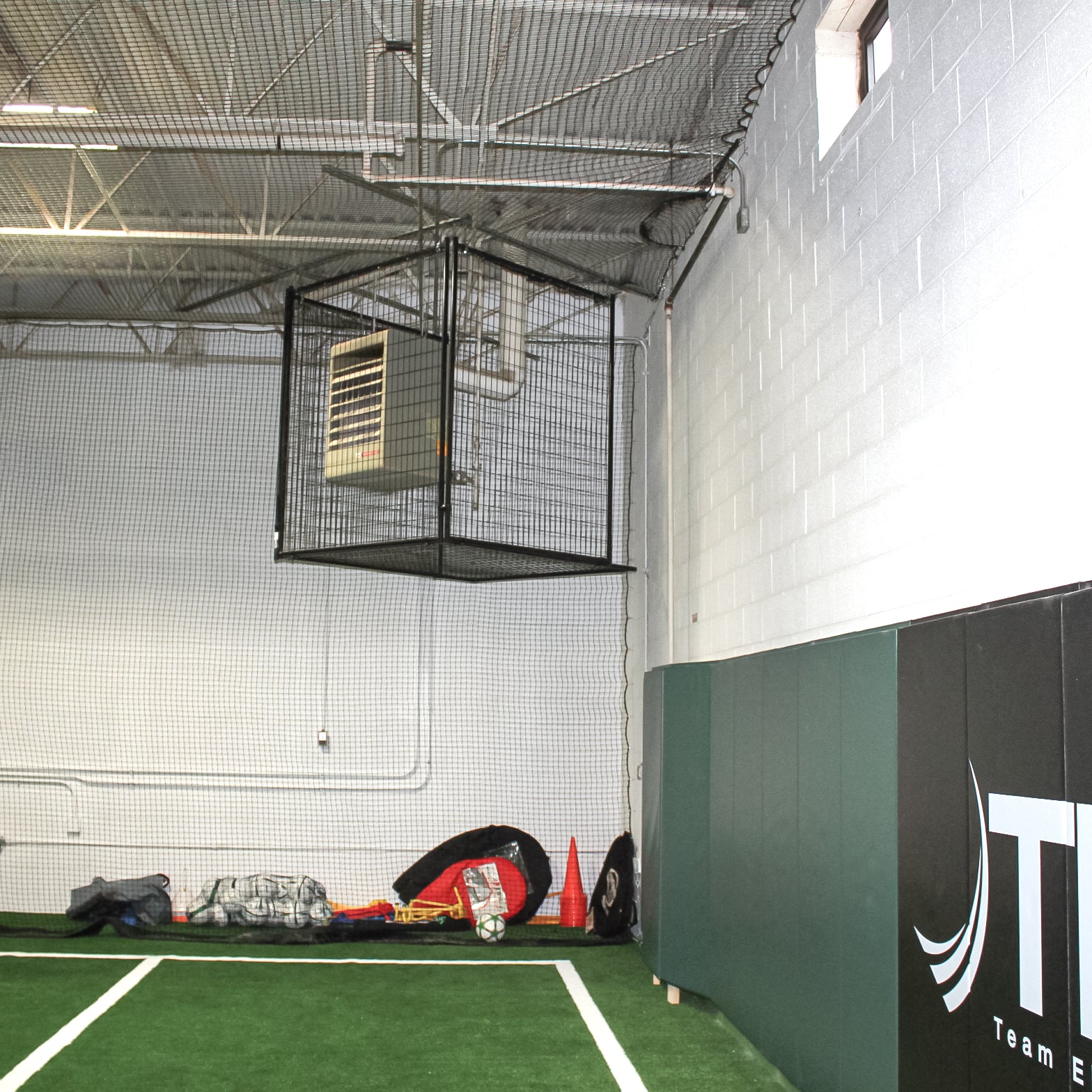 Furnace cage at an indoor soccer facility.