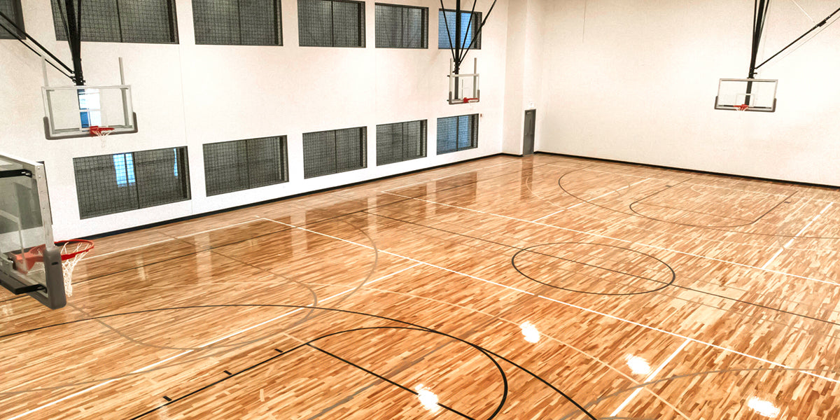 Two full court gyms with WNBA and NBA lines with upper and lower viewing decks.
