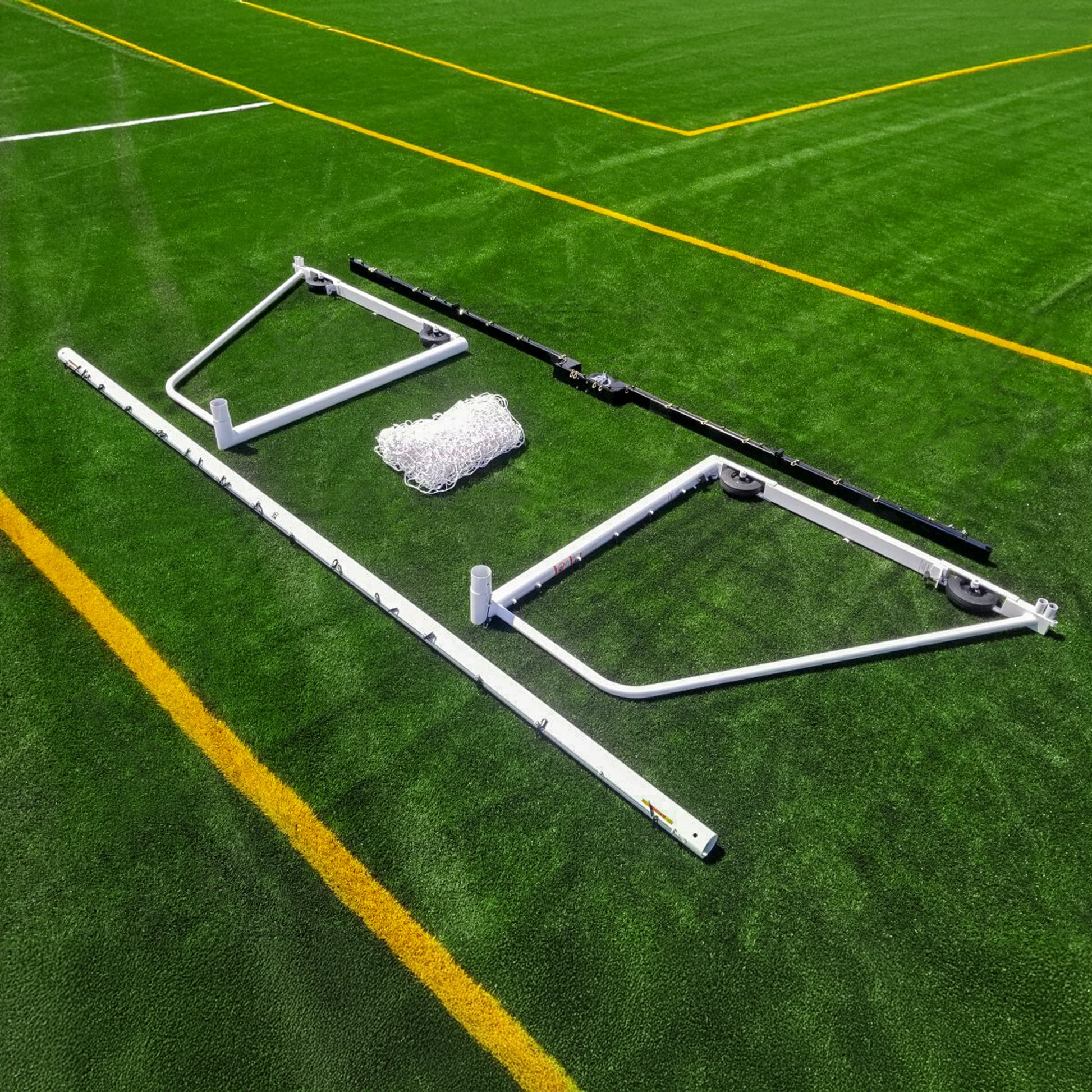 Model #M88WRD466186. 6'6" x 18'6" pre-assembley wheeled soccer goal.