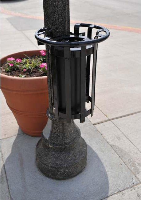 Model #PRBRKTLP. Metal tree guard with ash urn.