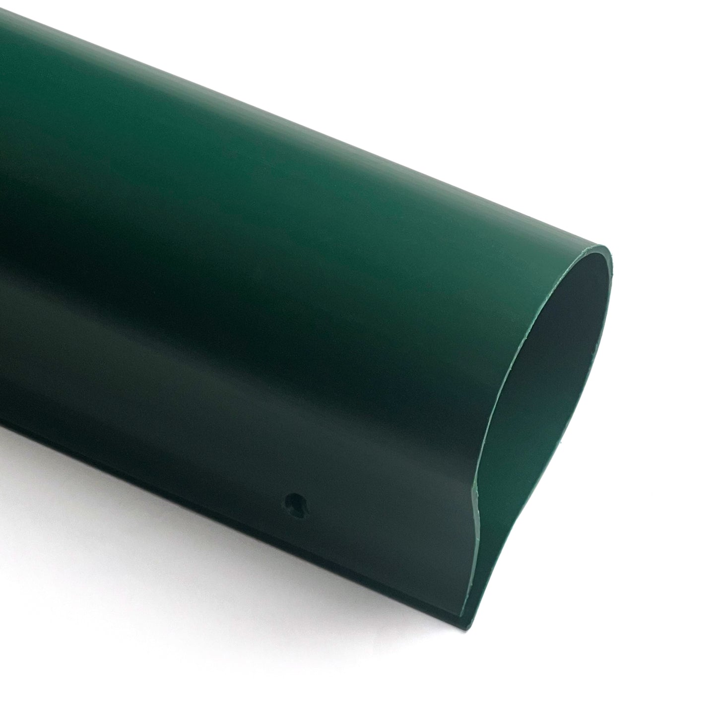 A close-up of the Premium Fence Guard, a dark green, semi-cylindrical metal pole with a smooth finish and small hole near the end. This UV-resistant fence cap is angled diagonally on a white background, ensuring protection and durability.