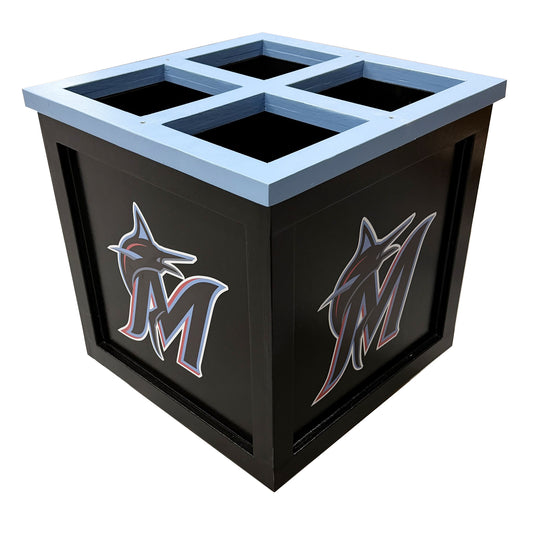 The Grizzly Dugout Bat Storage Unit is a black wooden bat box with light blue trim, four square top openings, and Miami Marlins logos on each side for custom MLB-style team branding.