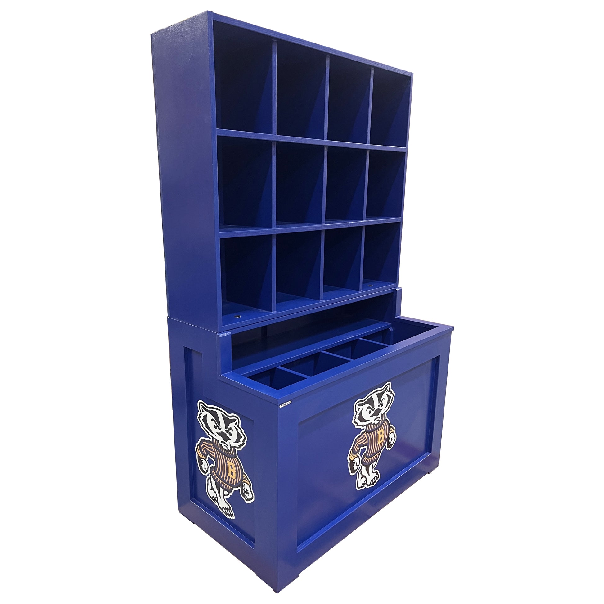 The Sergeant Major Dugout Helmet and Bat Rack is a blue wooden storage unit with open cubbies for organizing team gear. It holds 12 helmets and features cartoon badger mascots on the panels—perfect for baseball and softball dugouts.