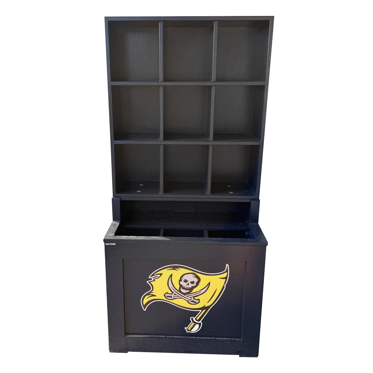 The Trooper Dugout Helmet and Bat Rack is a black wooden unit with open cubbies and a lower storage compartment, ideal for organizing 9 helmets or bats. It features a yellow skull and crossed swords flag logo on the front panel.