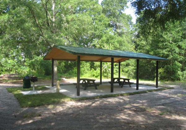 Model #RCPLWG2028-03. 20'x28' laminated wood gable park shelter with optional steel columns and metal roofing.
