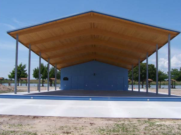 Model #RCPLWBSG305054-03. 30'x50'x54' laminated wood gable band shell.