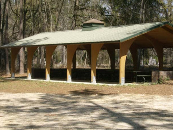 Model #RCPLWAG2852-04. 28'x52' laminated wood arch gable park shelter with optional cupola.