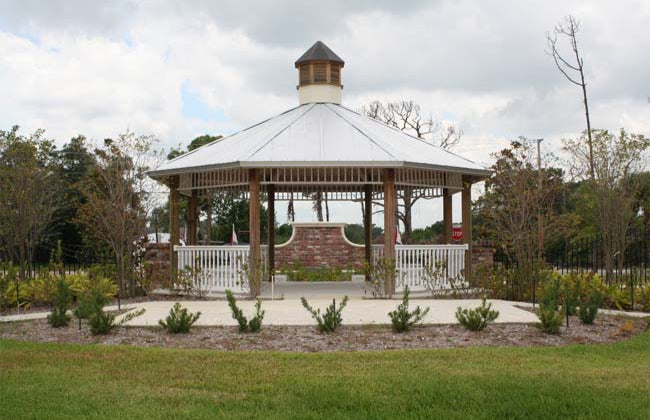 Model #RCPLWOCT25-06MC 25' radius laminated wood octagonal shelter with metal roof and optional cupola.