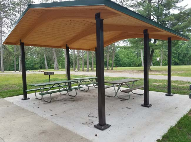 Model #RCPLWG202003. 20'x20' laminated wood gable shelter with optional steel columns and metal roofing.