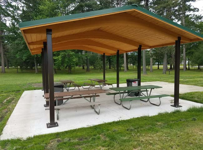 Model #RCPLWG202803. 20'x28' laminated wood gable shelter with optional steel columns and metal roofing.