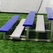3 row bleachers at indoor sports complex.